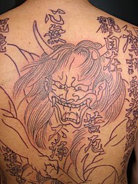 夜叉に生首の刺青 デザイン 夜叉 生首 般若心経 文字の刺青画像和彫り 刺青 タトゥーデザイン